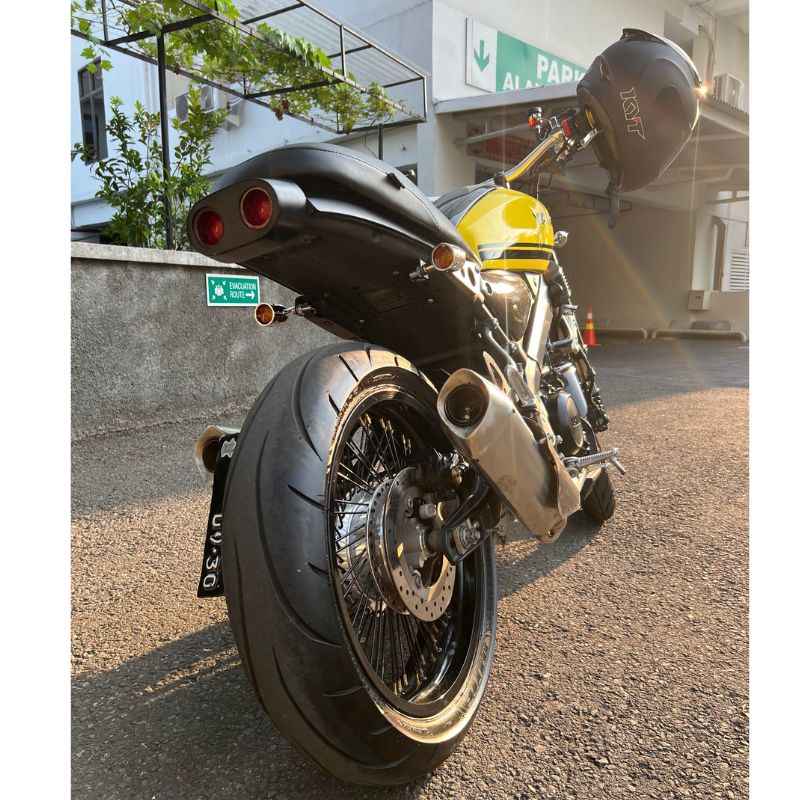 Rear view of Yamaha XSR155 with Neo Muscle stainless steel performance exhaust installed