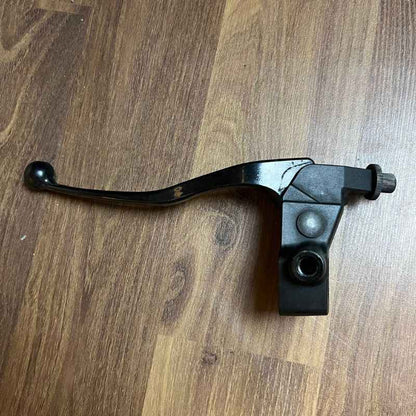 Close-up of the original Yamaha XSR155 OEM clutch lever with factory perch and cable adjuster removed from the Neo Muscle project motorcycle. Genuine Yamaha clutch lever assembly for OEM replacement or stock restoration.