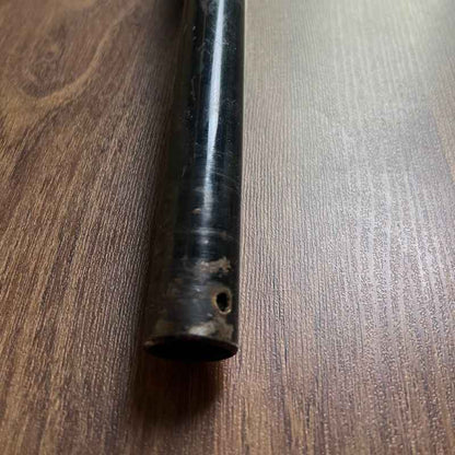 Close-up of the end section of the original Yamaha XSR155 OEM handlebar showing the factory control mounting hole and tube condition. Genuine Yamaha handlebar removed from the Neo Muscle project motorcycle, suitable for OEM replacement or restoration.