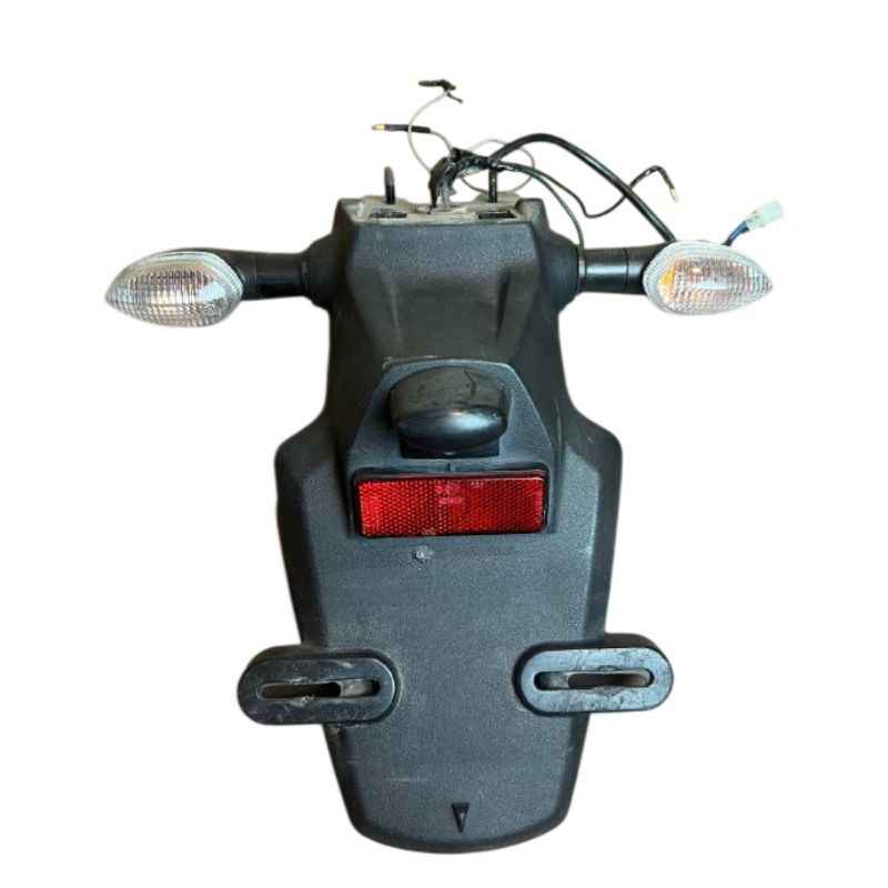 Front view of the original Yamaha XSR155 OEM rear fender assembly with factory turn signals, license plate bracket, reflector, wiring harness and connectors removed from the Neo Muscle project motorcycle.