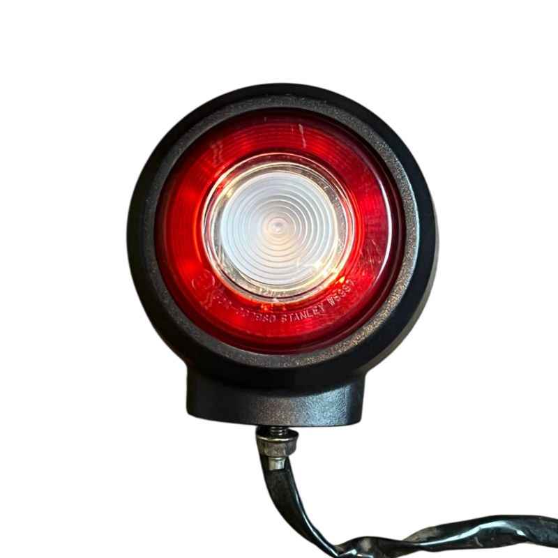 Front view of the original Yamaha XSR155 OEM rear light with integrated tail lamp, stop lamp and rear lamp lens. Genuine Yamaha factory rear light removed from the Neo Muscle project motorcycle, perfect for OEM replacement or restoration.