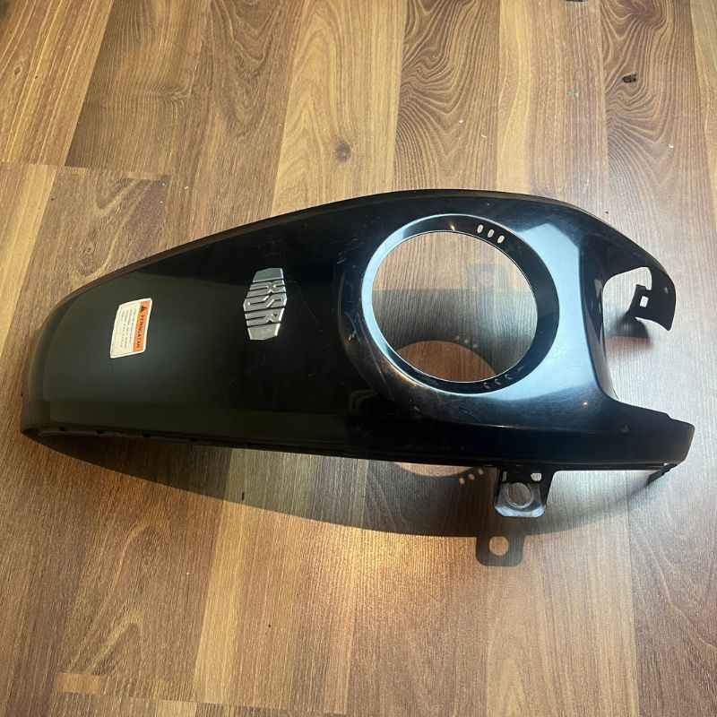 Angled view of the original Yamaha XSR155 OEM upper tank cover with factory XSR logo and fuel cap opening. Genuine Yamaha fuel tank cover removed from the Neo Muscle project motorcycle, showing original mounting points and light cosmetic scratches from normal use.